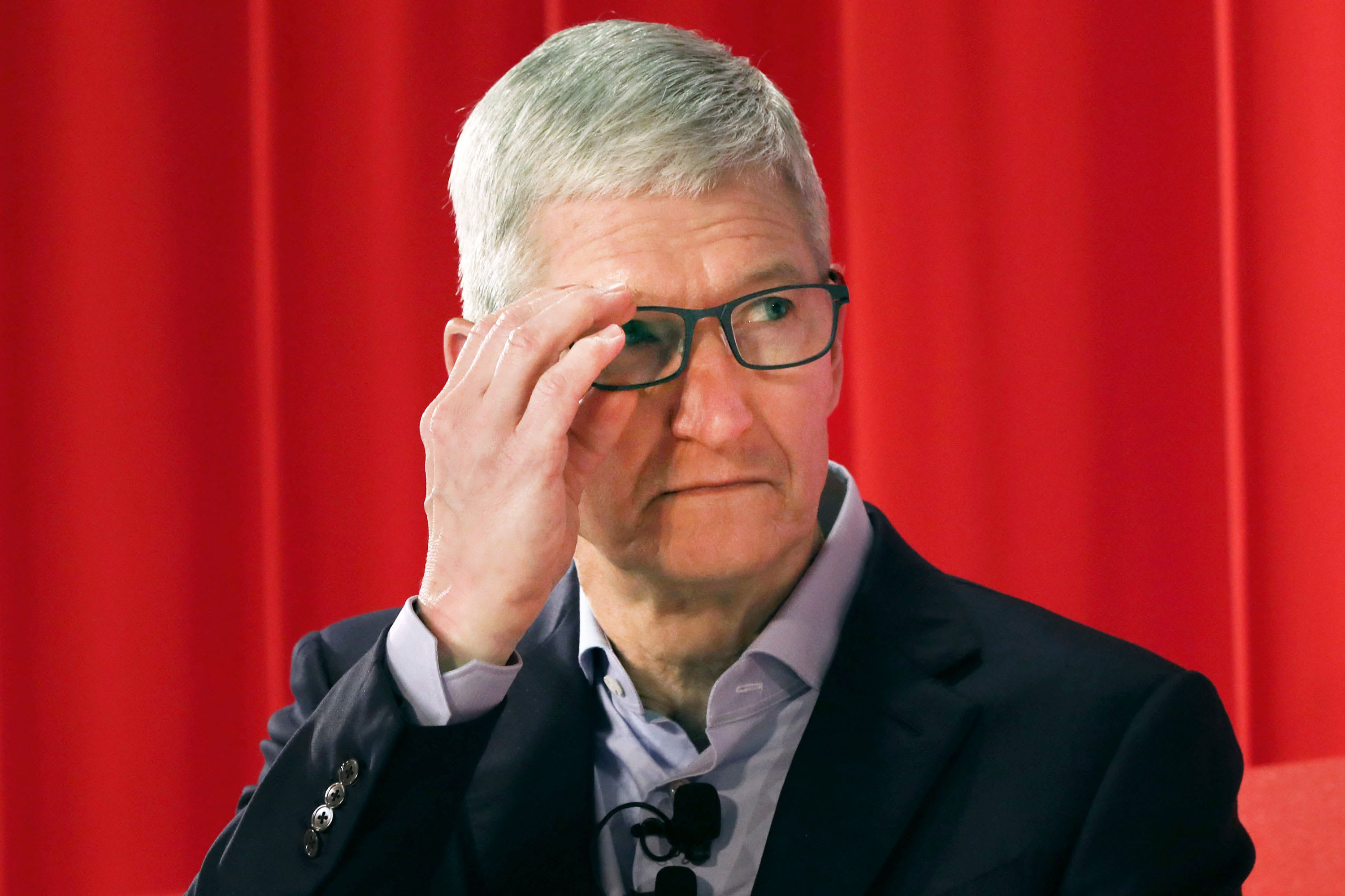 Tim Cook says Apple has shut one store in China and is restricting employee travel because of coronavirus