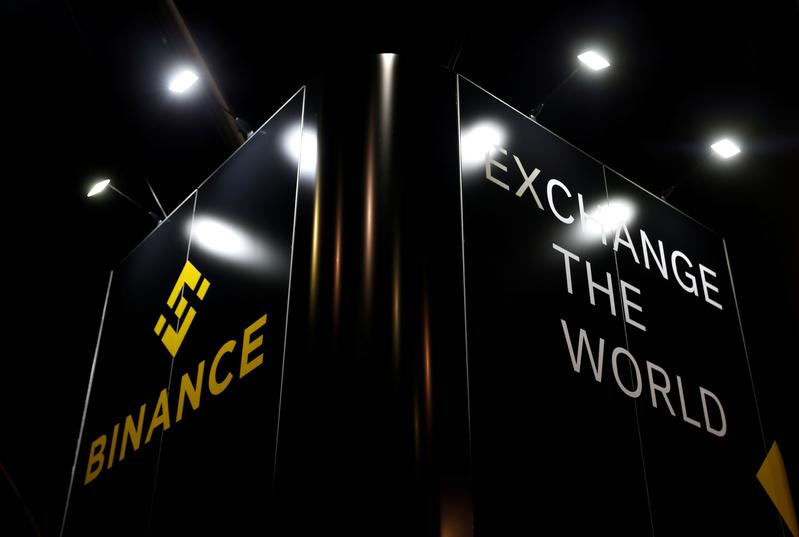 Crypto exchange Binance to double compliance staff as regulators circle