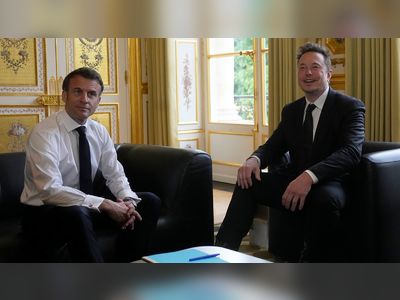 Elon Musk tells Emmanuel Macron he had to to 'sleep in the car' before their meeting - hours after he was seen partying